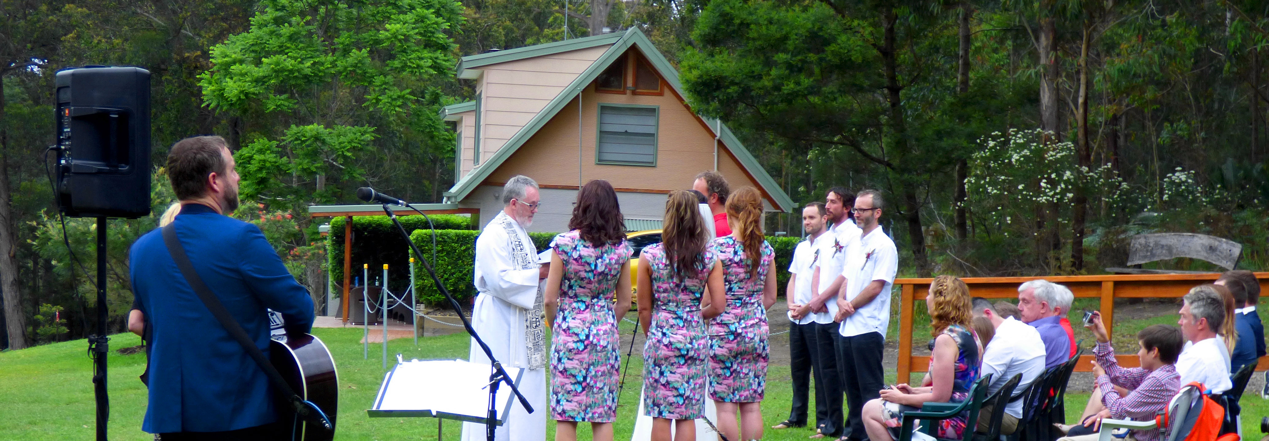 3 Way Split performing live music at an outdoor wedding ceremony